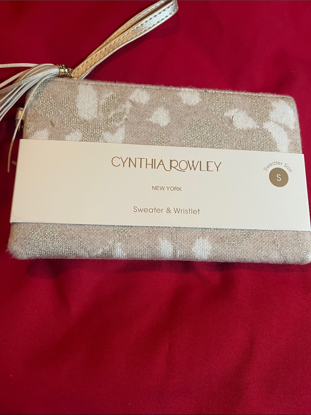 Cynthia Rowley Shimmery Beige and White Tassel Wristlet